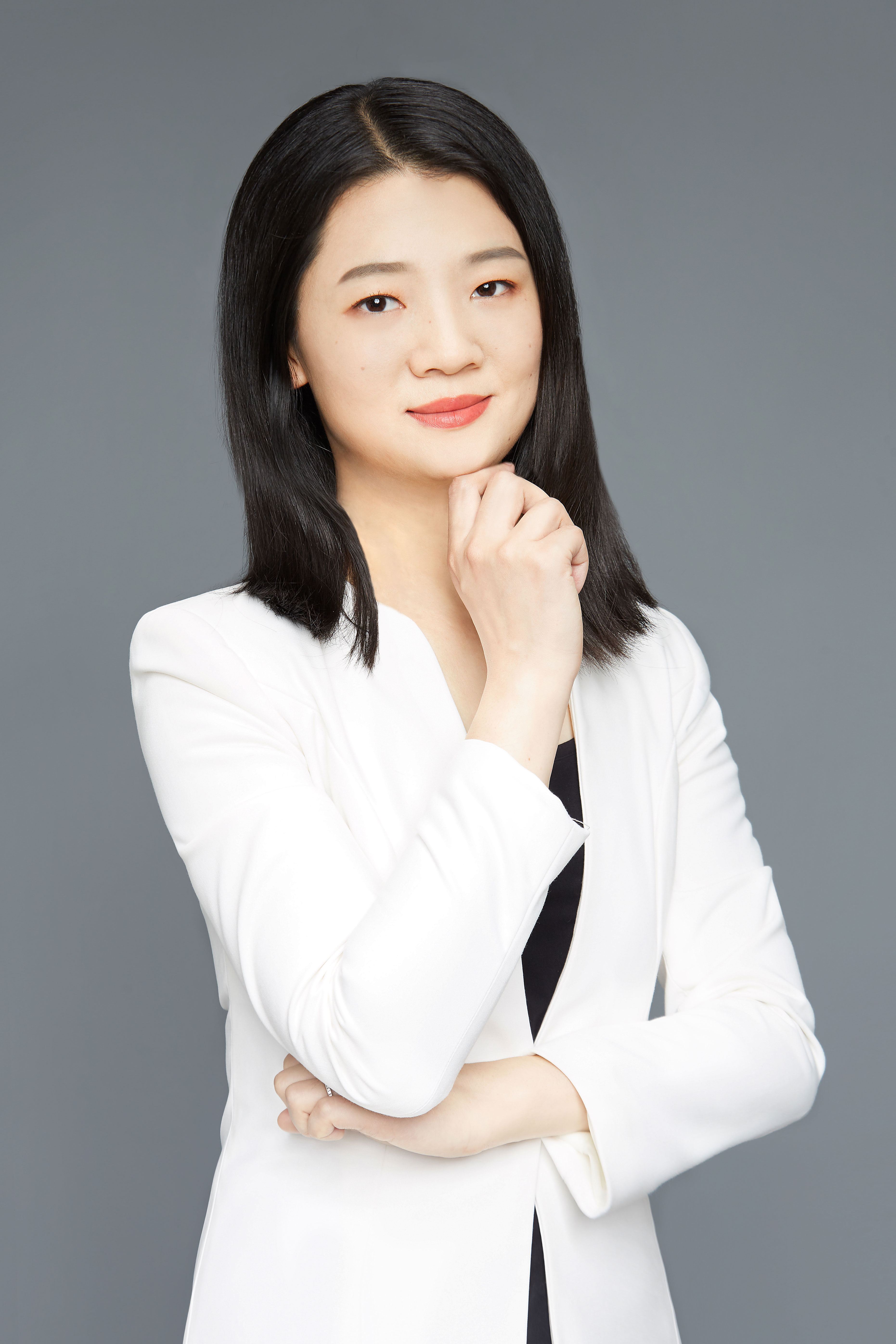 Tan LI
